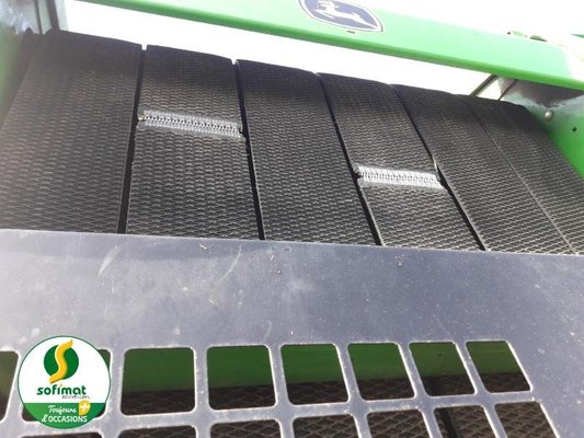 Presse à balles rondes John Deere 864