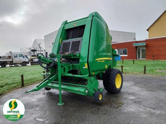 Presse à balles rondes John Deere 864