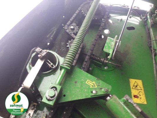 Presse à balles rondes John Deere 864 PACK